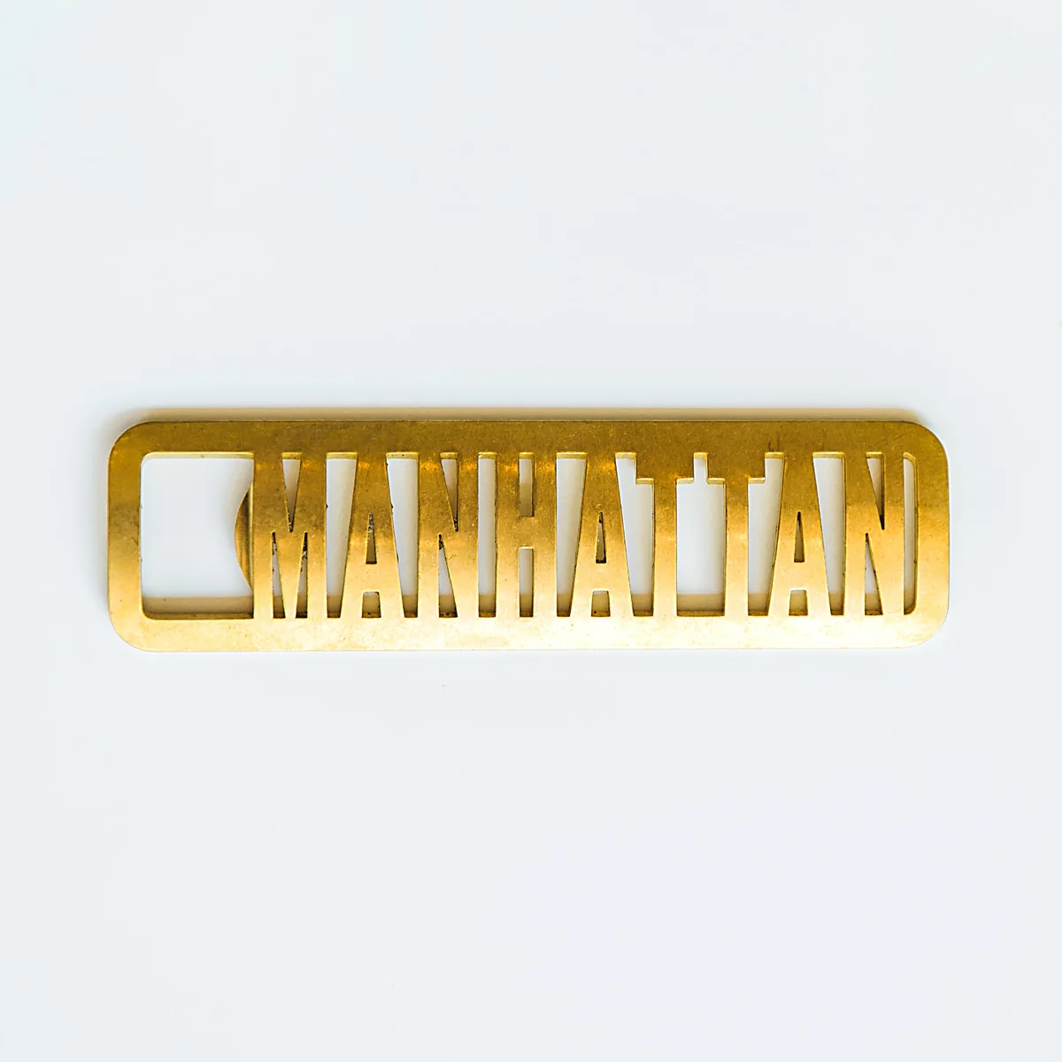 Genuine Manhattan Brass Bottle Opener Excellent