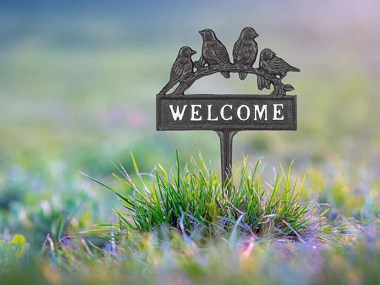 Green Lawn Welcome Sign Responsible